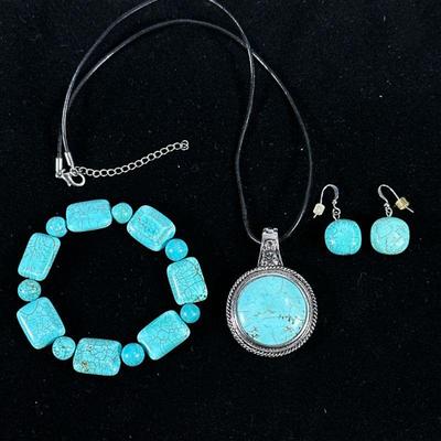 (3pc) TURQUOISE JEWELRY | Including: pair of round turquoise earrings, necklace with round carved turquoise in mixed metal pendant, and...