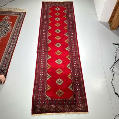 RED GEOMETRIC RUNNER | Having red backing with geometric medallions and border. - w. 36 x l. 124 in

