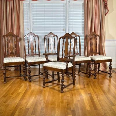 (6pc) ANTIQUE CARVED WOOD DINING CHAIRS | Including: 1 armchair & 5 side chairs having carved back over spindle carved and fluted...