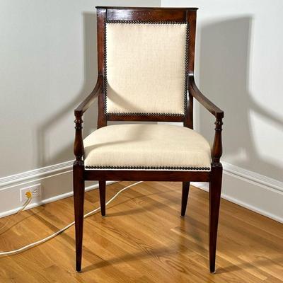 HENREDON CARVED ARMCHAIR | Henredon furniture carved wood armchair with riveted cream upholstery. - h. 39.5 x w. 20 x l. 22 in

