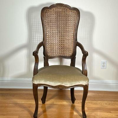 CANED BACK ARMCHAIR | Having carved caned back over cabriole legs. - h. 45 x w. 19.5 x l. 22 in

