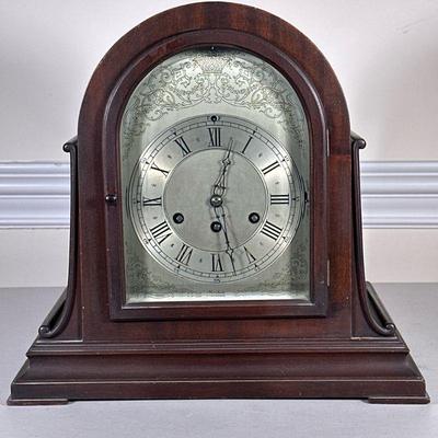 HERSCHEDE SYMPHONY MANTEL CLOCK | Early 20th century carved wood Herschede mantel clock with roman numeral dial and “Symphony Rods” - h....