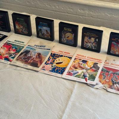 (6) Atari Game Cartridges With Booklets
Mars Revenge, Missle Command, PacMan, Defender, Berzerk, Combat - all with the booklets. Includes...