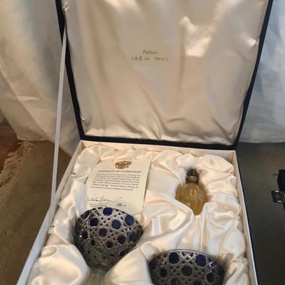 Faberge eggs with perfume bottles in boxes