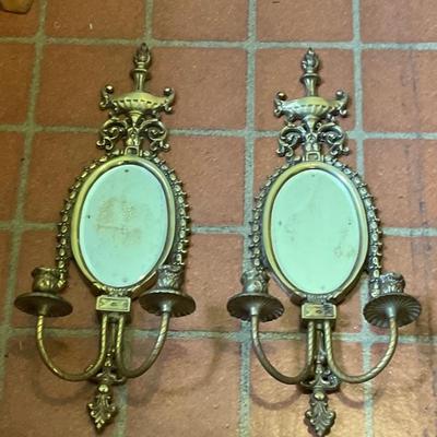 Brass wall sconces with mirrors