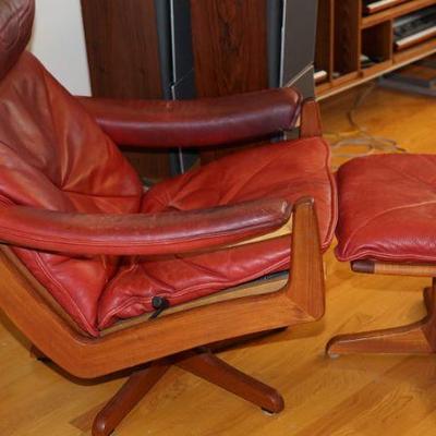 Teak framed reclining chair with ottoman. not marked. The leather has some soiling and needs to redone or restored. 