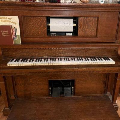 electric player piano, works! Comes with 40+ music scrolls