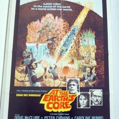 1046	VINTAGE MOVIE POSTER *AT THE EARTHS CORE* 1976, PETER CUSHING, DOUG MCCLURE, APPROXIMATELY 27 IN X 41 IN
