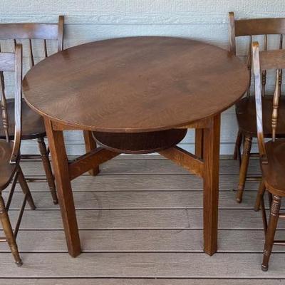 Antique Quarter Sawn 38 Inch Round Oak Table With Round Self Underneath & 4 Maple Spindle Back Chairs