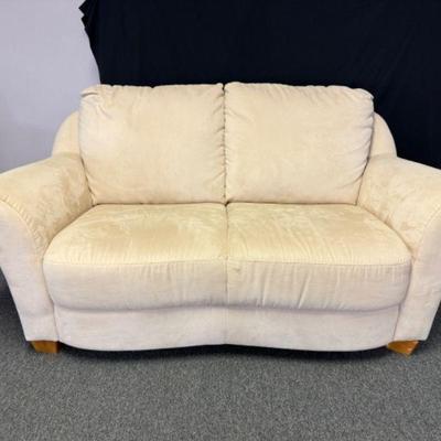 Retro-Inspired Cream Loveseat w/ Curved Arms & Wooden Legs	