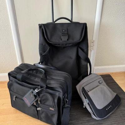 TUMI Travel Trio: Rolling Duffel, Tech Sling, & Business Bag	