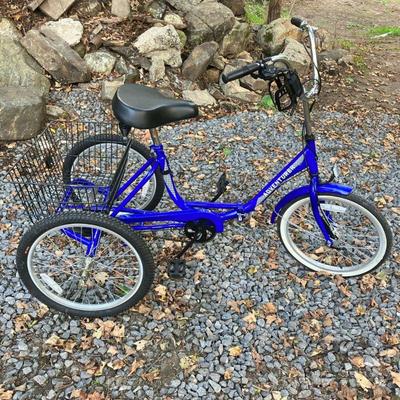 Adventurer Folding Trike | Three speed Woman’s Tricycle in a deep blue. Rear foot brake and hand brake, large rear basket, 20” tires on...