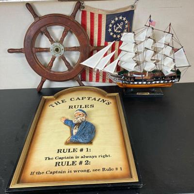 (2pc) Nautical Group Ship’s Wheel & Ensign Flag | Lot includes: 1. Ships Wheel. 2. Yacht Ensign Flag on pole. 3. Constitution Wooden...