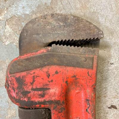 Ridgid 48” Wrench | “The Ridgid Tool Co Flyria Ohio USA 48”Heavy Duty” in original red paint. - h. 2” x w. 7” x l. 48” in