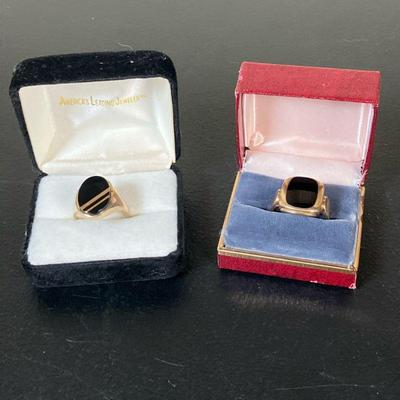 (2pc) Gold & Onyx Rings | Vintage Lot Includes: 1. Oval Onyx Ring with two gold stripes. Marked “SJ”. 7/8”D. 4.46 grams. 2....