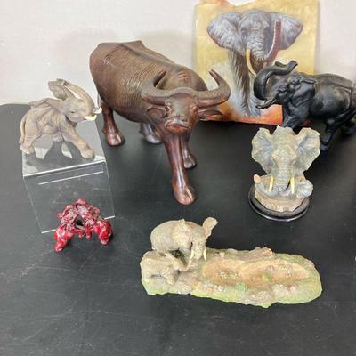 Elephant Collection | Large group of Elephants in wood, glass, cast iron and resin, Elephant painted on a piece of slag, Photo of girl...