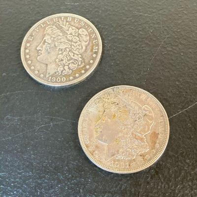 (2pc) Morgan Silver Dollars | 1. Morgan 1900-O New Orleans 2. Morgan 1921 Philadelphia. The last year the Morgan was minted.