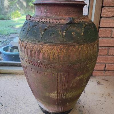 Terracotta pot with incised sroll