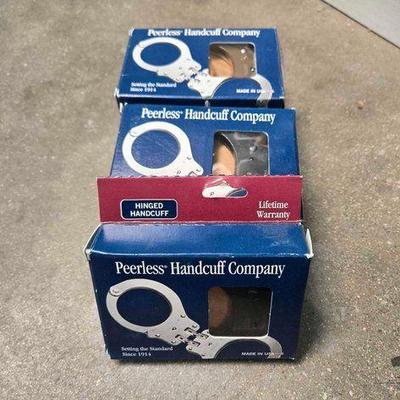 #5072 • NEW!! Peerless Handcuffs Black Hinged
