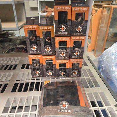 #5218 • (10) Eleven 10 Rigid TQ Cases and (1) QD Square Med Pouch
