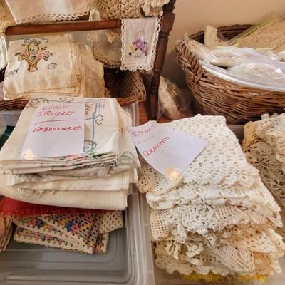 Embroidered & crocheted tablecloths, placemats, etc.