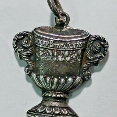 https://www.agesagoestatesales.com/product/sugar-bowl-classic-1946-football-game-vintage-sterling-silver-charm/1106