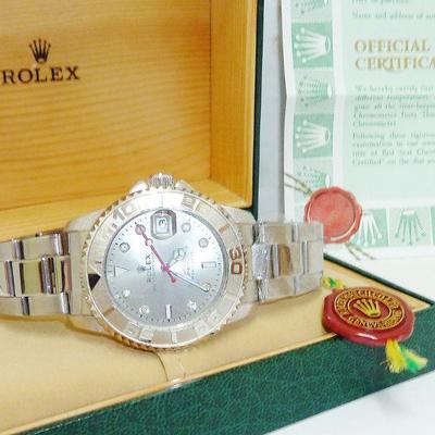 wristwatch in case, mkd ROLEX