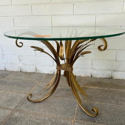 Hollywood Regency • Gilt • Wheat Sheaf • Motif • Glass Top • End/Lamp Table •
28”dia x 20”h • $240 ea • (two available)