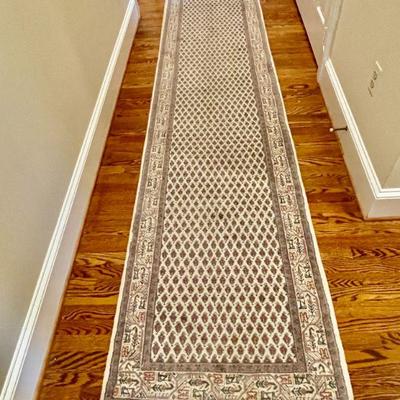 Hand-knotted wool runner rug from India, measures 12' x 2'7