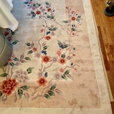 Hand-knotted wool rug, measures 12'.5 x 8'.5