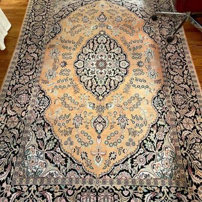 Hand-knotted silk "Kashan" area rug, measures 9'5 x 6'