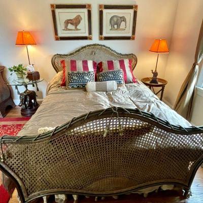 Queen-size bed with metal and rattan head and footboard