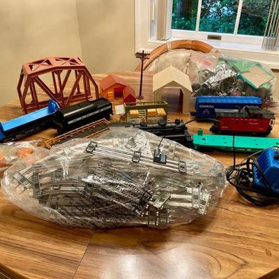 Ho-scale plastic train set with metal vintage Lionel engine car