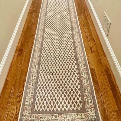 Hand-knotted wool runner rug from India, measures 14'4 x 2'5