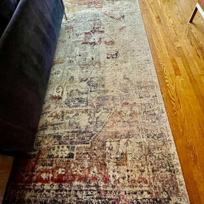 Machine-made wool area rug, measures 12'x 5'6