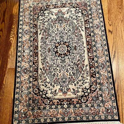 Hand-knotted silk "Kashan" area rug, measures 3'3 x 2'1