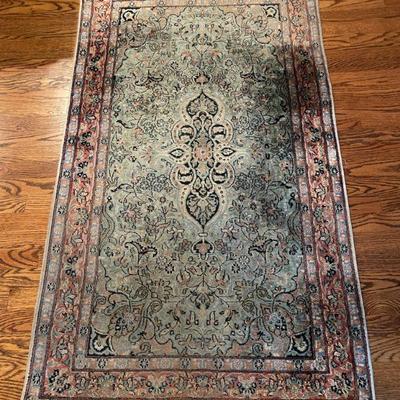 Hand-knotted silk "Kashan" area rug, measures 5'1 x 3'