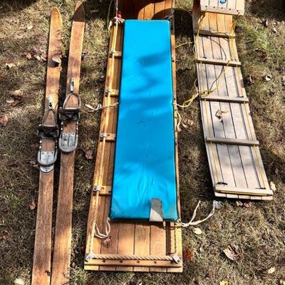 (2) Tobaggans & Vintage Skis
