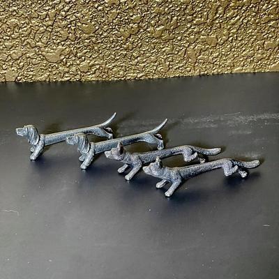 Set a four pewter knife rests