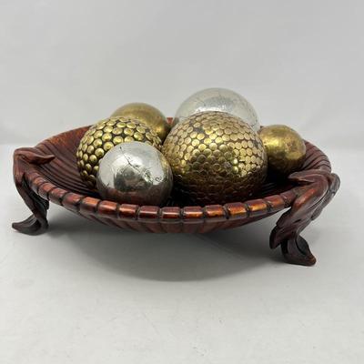 Decorative Metallic Spheres with Textured Finish in a Rustic Wooden Bowl Centerpiece