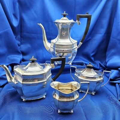 Four Piece Coffee and Tea Service by I.F.S Sheffield, England - Silver Plate with Black Handles