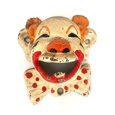 Iron clown bottle opener in old paint