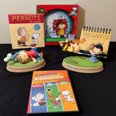 Peanuts Clock * 2 Hallmark Action Figurines * 2011 Desk Calendar * 2014 Wall Calendar * DVD
