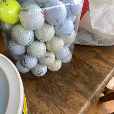 Boxes and tubs full of golf balls. Used and New!