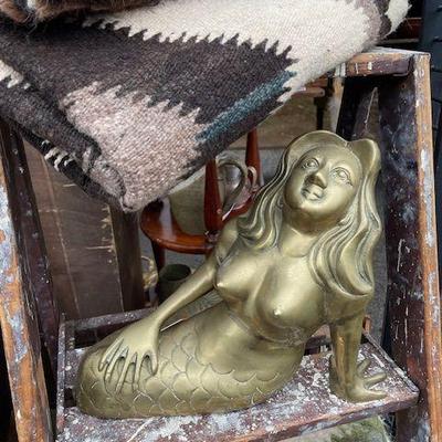 brass figures, mermaid, woven run