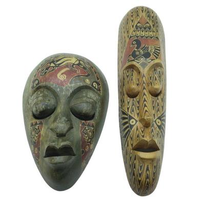 2 VINTAGE HAND CARVED LOMBOK INDONESIAN MASKS