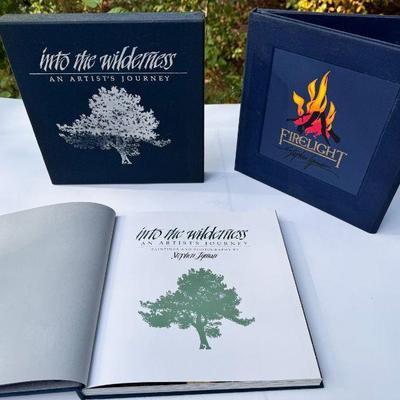 (2) Stephen Lyman Books
Firelight foldable book with a signed print inside. 
Into The Wilderness signature inside. 