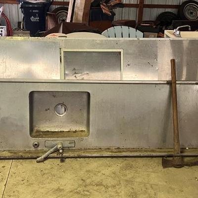 Work sink with metal countertop