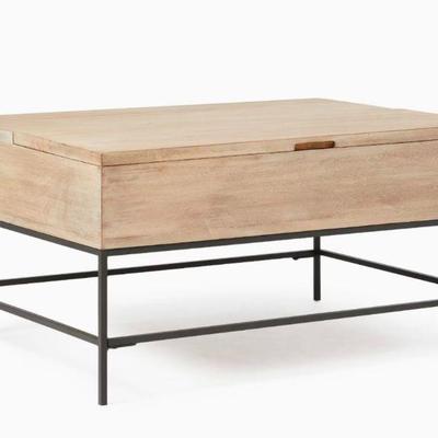 West Elm coffee table that turns into a desk. 