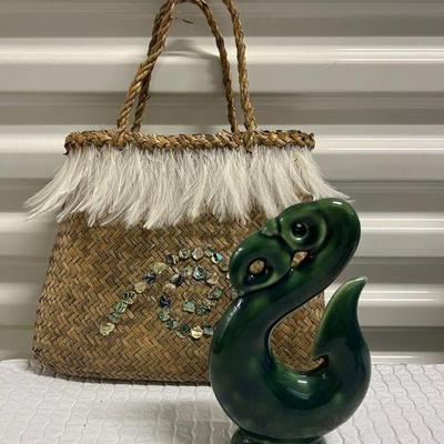 FTH190- Ceramic Sculpture Of The Manaia Fish Hook Together With Woven Bag